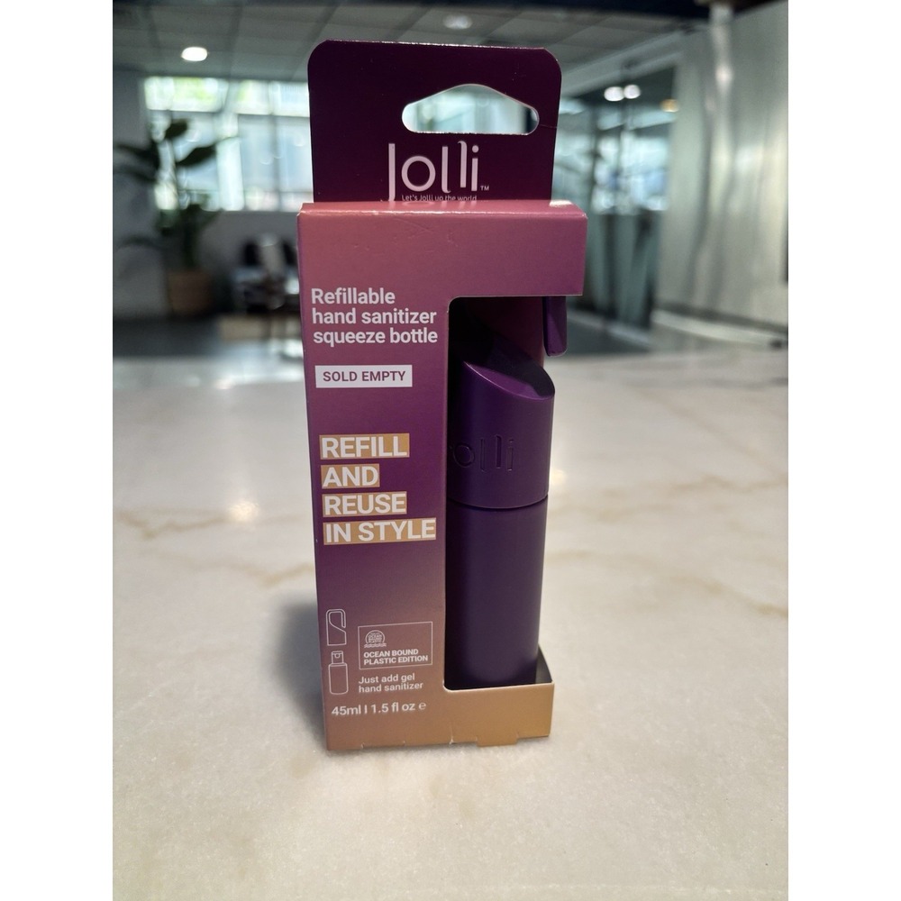 Brand new in box Jolli Refillable Hand Sanitizer Squeeze Bottle in purple